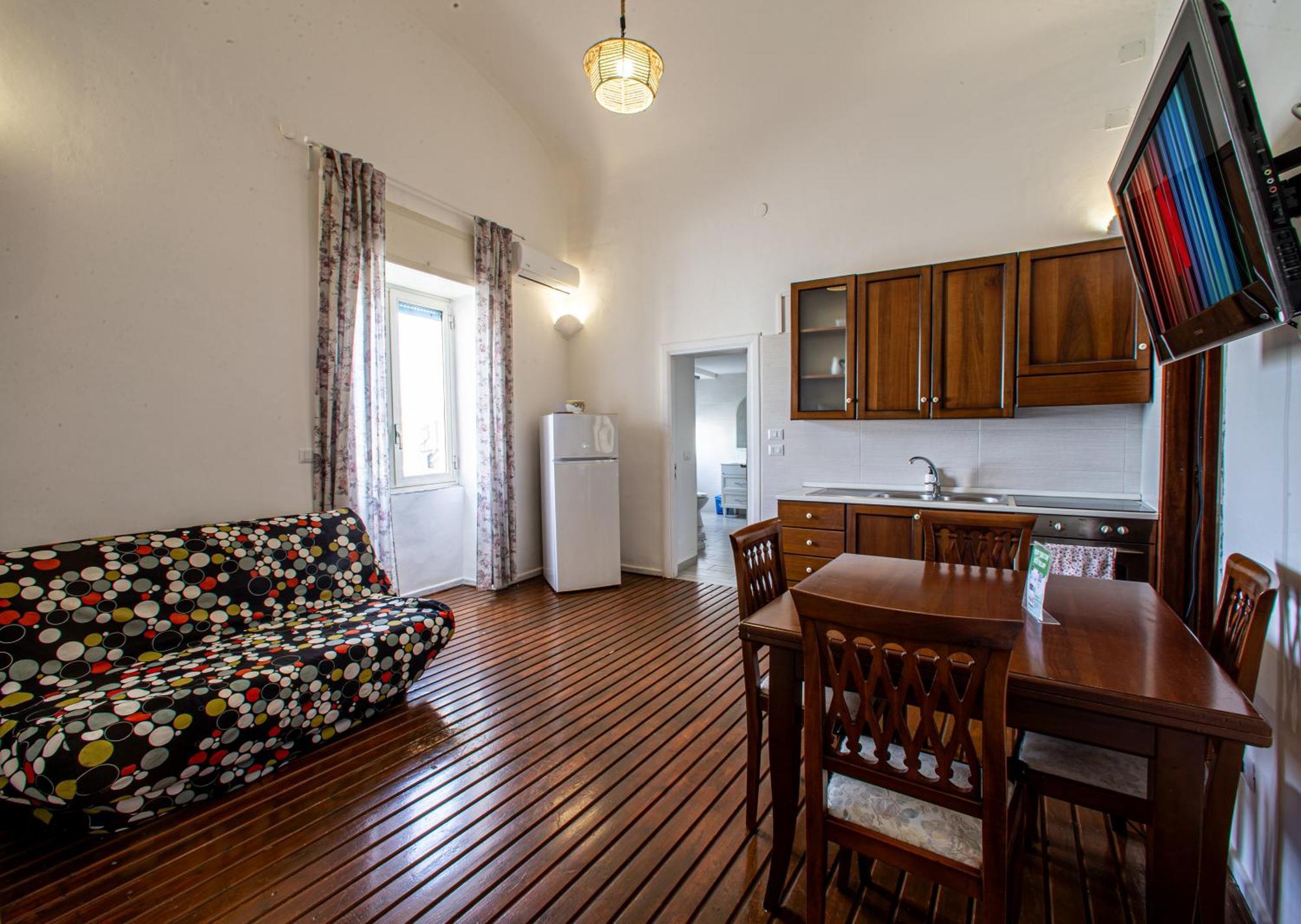 Mh Suites Rooms Apartments Bacoli Bagian luar foto