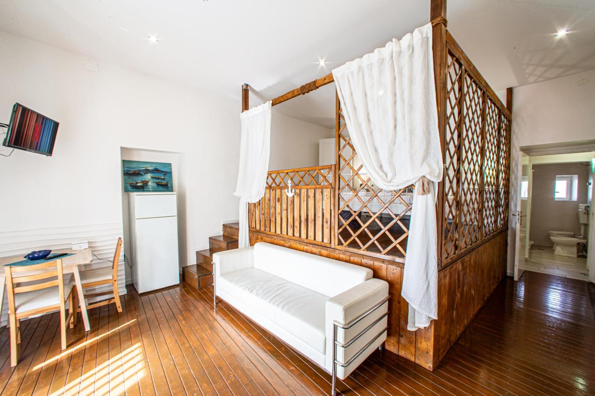 Mh Suites Rooms Apartments Bacoli Bagian luar foto